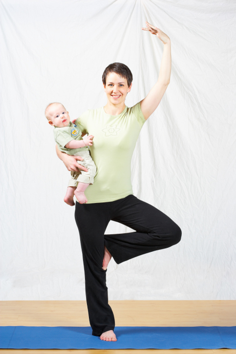 Working Mom Doing Yoga and Watching Child Working Mom Doing Yoga and Watching Child